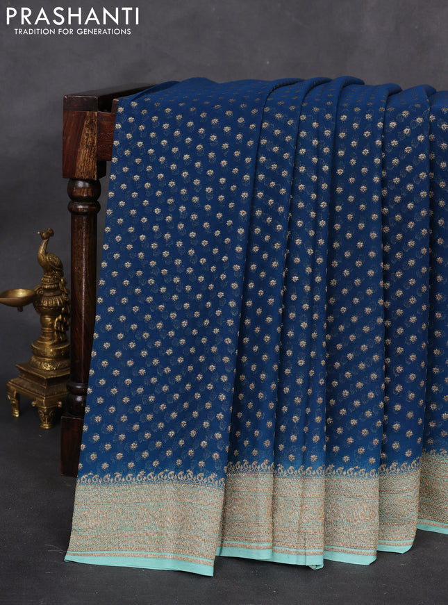 Banarasi georgette saree peacock green and teal blue shade with allover woven buttas and woven border
