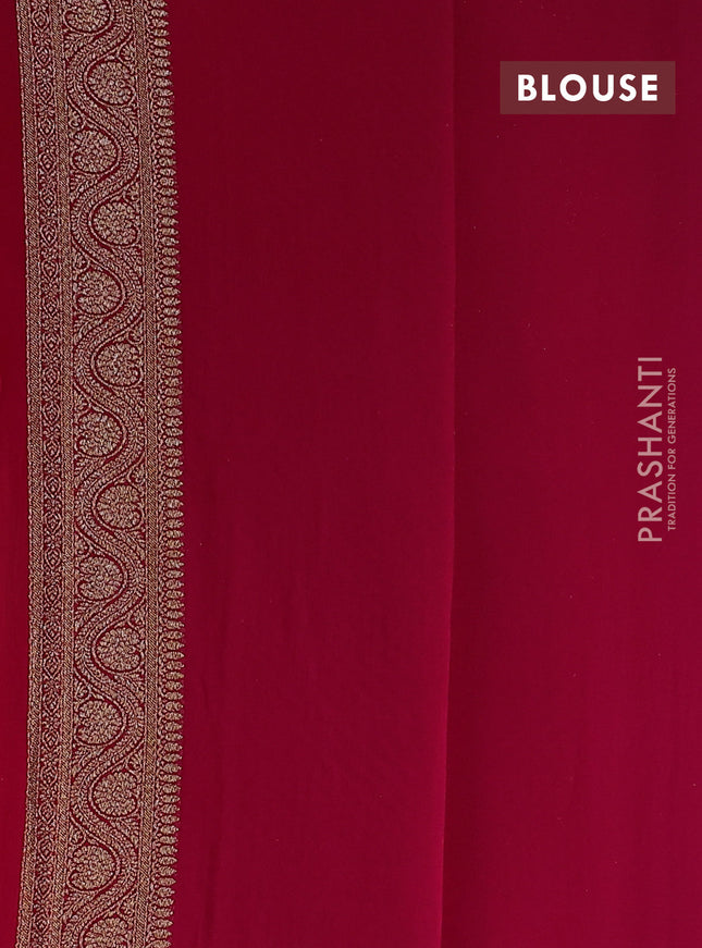 Banarasi georgette saree orange and pink with allover woven buttas and woven border