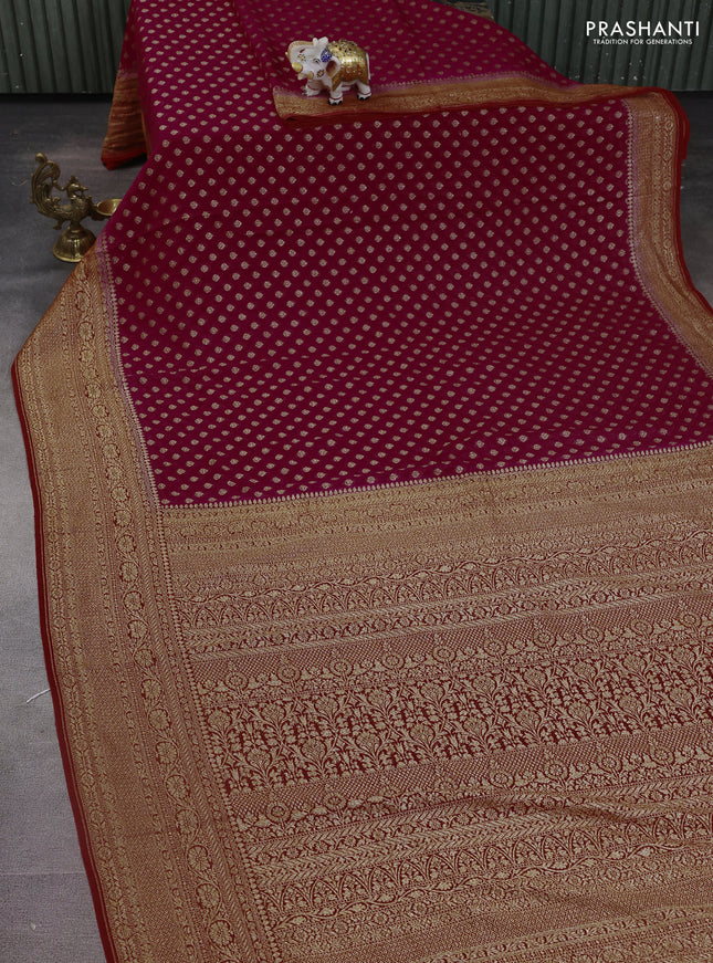 Banarasi georgette saree pink and orange with allover woven buttas and woven border