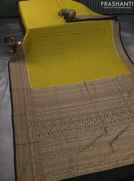 Banarasi georgette saree lime green and black with allover woven buttas and woven border
