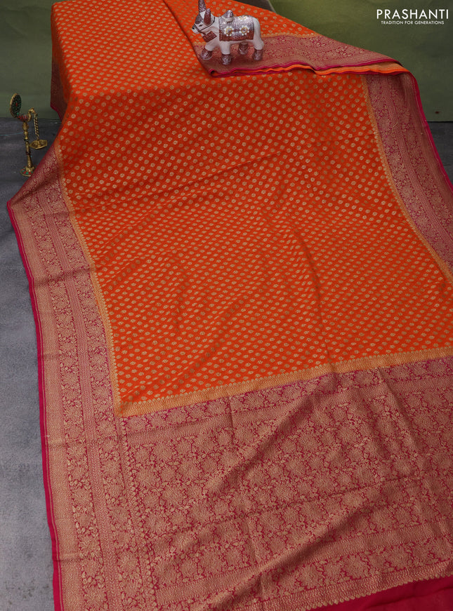 Banarasi georgette saree orange and pink with allover woven buttas and woven border