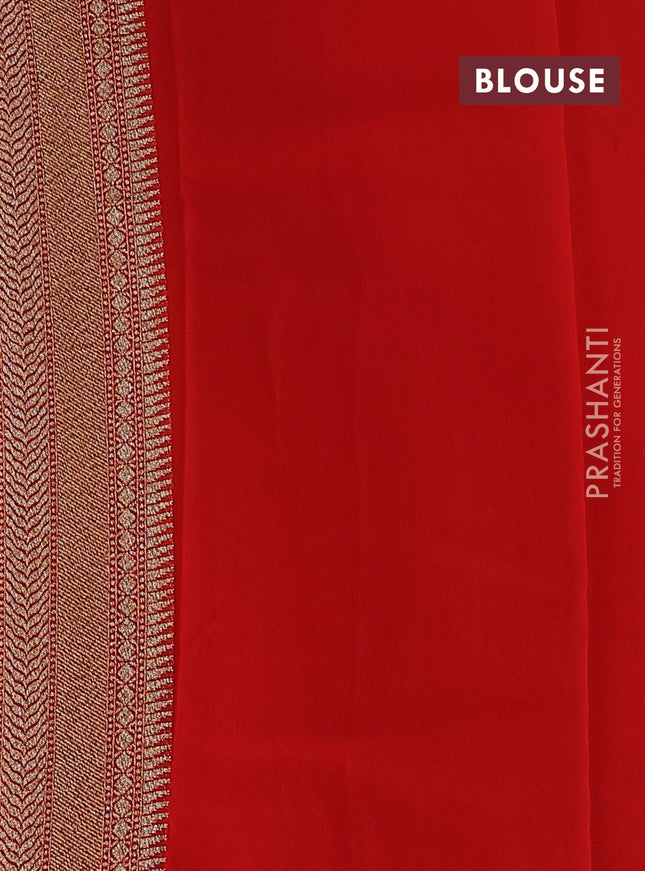Banarasi georgette saree orange with allover geometric weaves and woven border