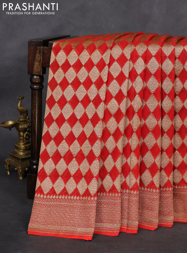 Banarasi georgette saree orange with allover thread & zari geometric weaves and woven border
