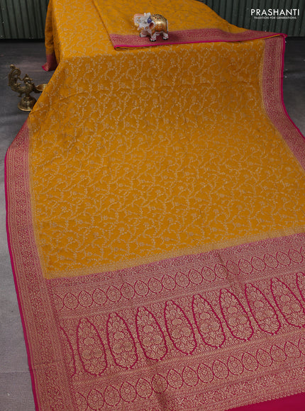 Banarasi georgette saree mustard yellow and pink with allover thread & zari weaves and woven border