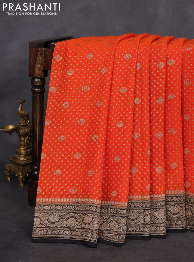 Banarasi georgette saree orange and black with allover woven buttas and woven border