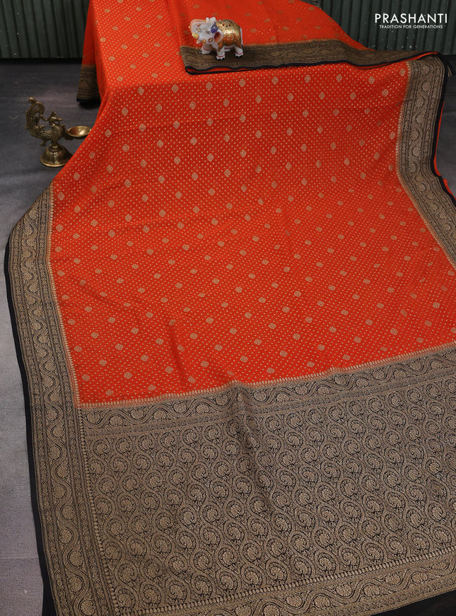 Banarasi georgette saree orange and black with allover woven buttas and woven border
