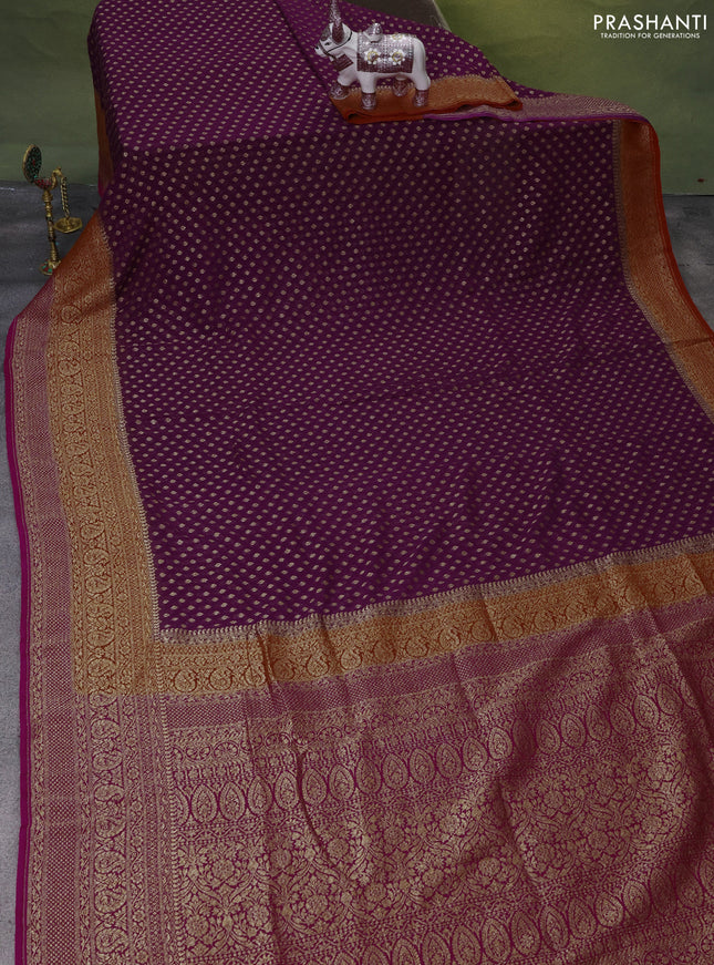 Banarasi georgette saree purple and orange pink with allover woven buttas and woven border