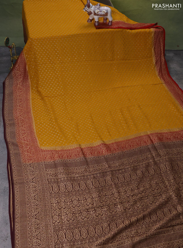 Banarasi georgette saree mustard yellow and red wine shade with allover woven buttas and woven border