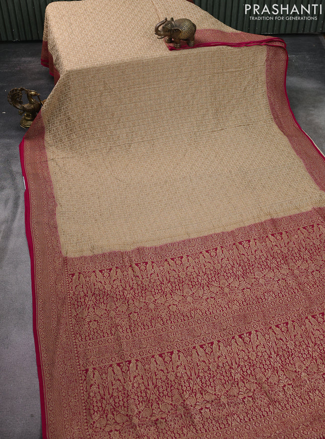 Banarasi georgette saree sandal and pink with allover checked pattern & buttas and woven border