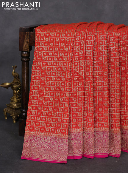 Banarasi georgette saree orange and pink with allover checked pattern & buttas and woven border