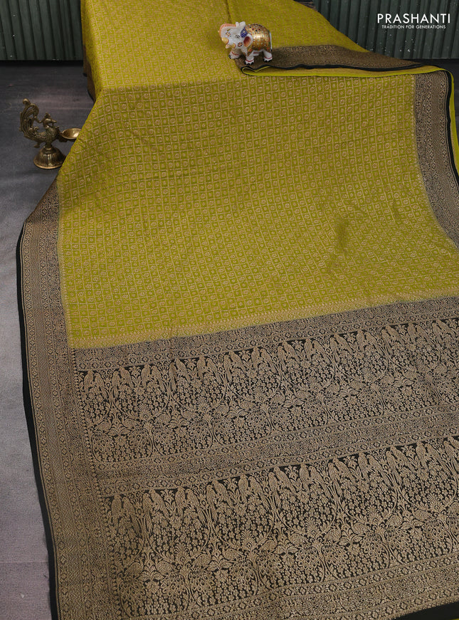 Banarasi georgette saree lime green and black with allover checked pattern & buttas and woven border