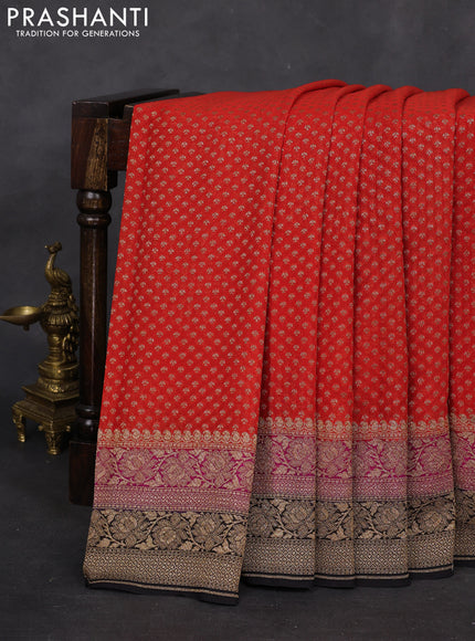 Banarasi georgette saree orange and pink black with allover woven buttas and woven border