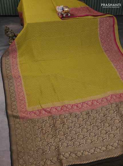 Banarasi georgette saree lime green and pink black with allover woven buttas and woven border