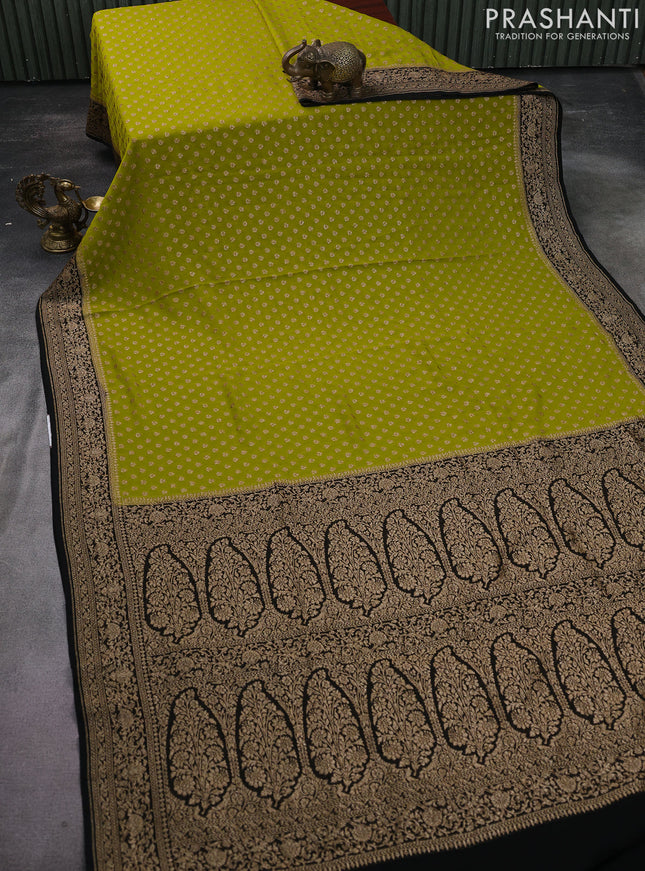Banarasi georgette saree lime green and black with allover woven buttas and woven border