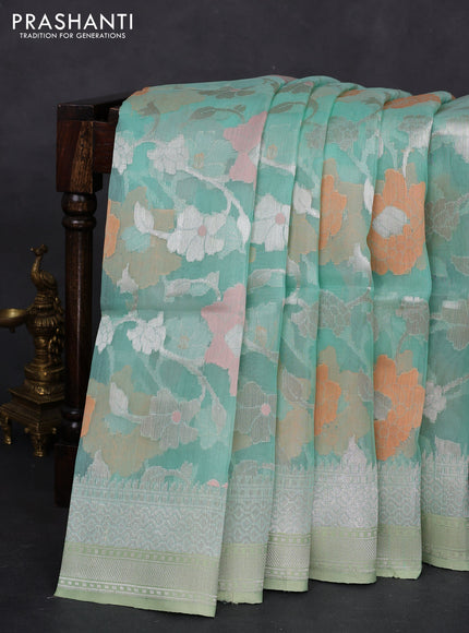 teal green shade and pastel green Banarasi kora jamdhani silk saree