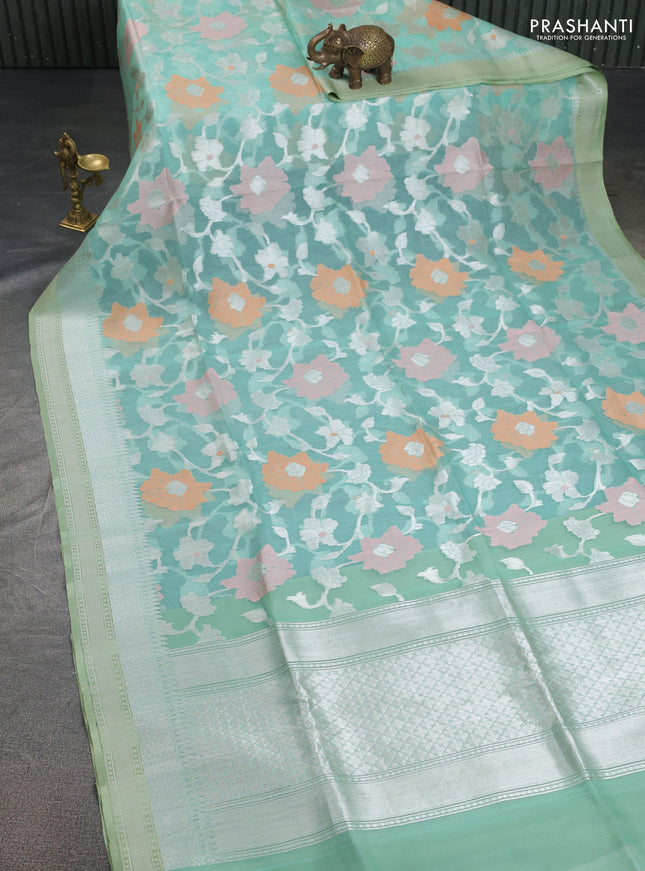 teal green shade and pastel green Banarasi kora jamdhani silk saree