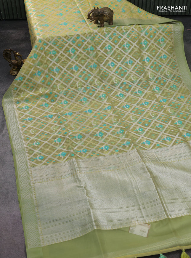 yellow and pastel green Banarasi kora jamdhani silk saree