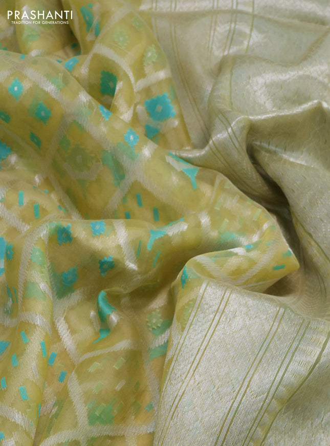 yellow and pastel green Banarasi kora jamdhani silk saree