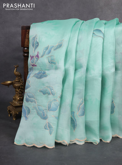 Pure organza silk saree teal blue with prints & pita work and embroidery scallop border