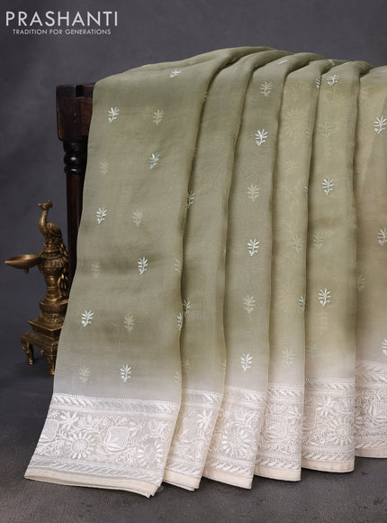Pure organza silk saree pastel green and cream with allover embroidery buttas and embroidery border