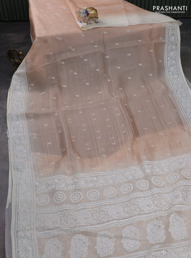 Pure organza silk saree sandal and cream with allover embroidery buttas and embroidery border