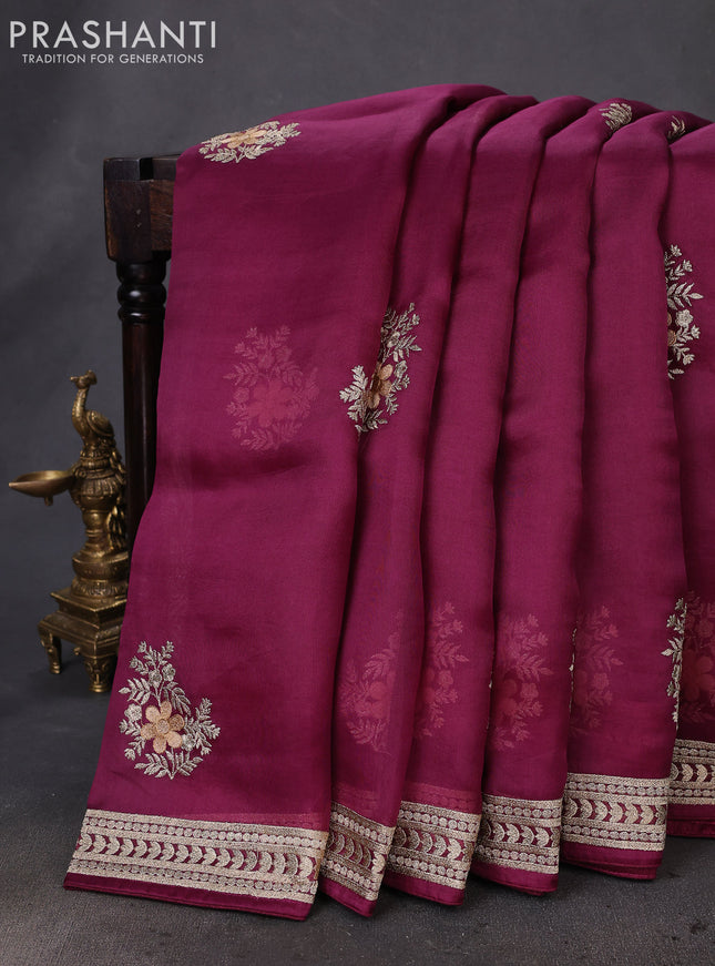 Pure organza silk saree wine shade with floral embroidery buttas and embroidery border