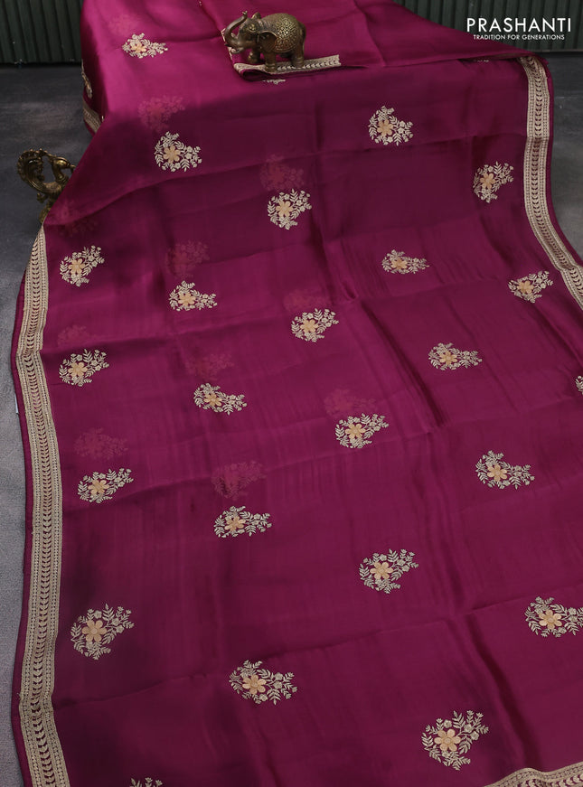 Pure organza silk saree wine shade with floral embroidery buttas and embroidery border