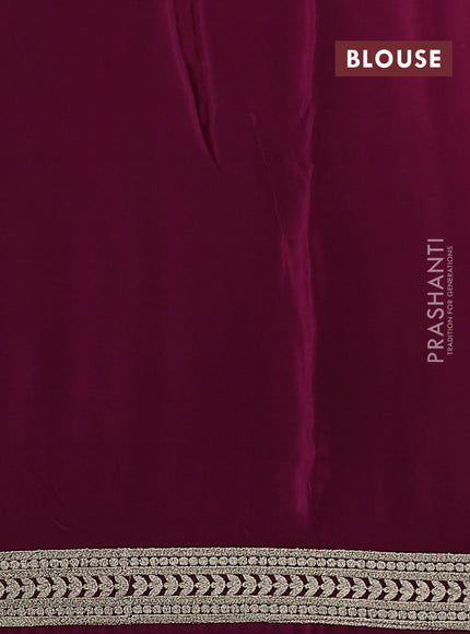 Pure organza silk saree wine shade with floral embroidery buttas and embroidery border