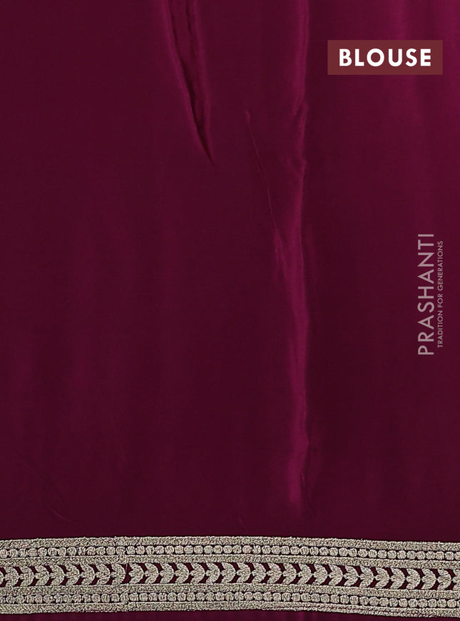 Pure organza silk saree wine shade with floral embroidery buttas and embroidery border