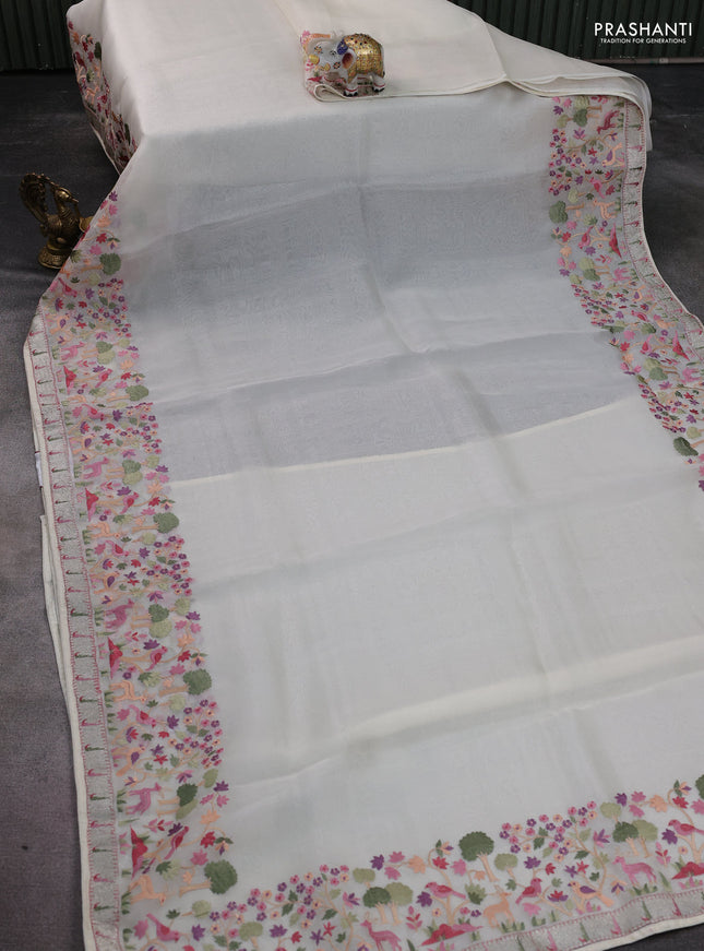 Pure organza silk saree cream with plain body and embroidery border