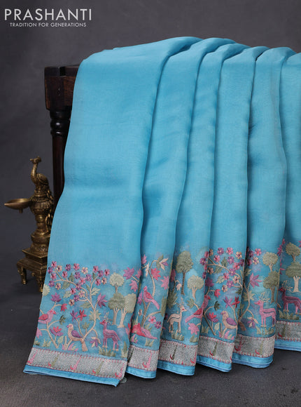 Pure organza silk saree blue with plain body and embroidery border