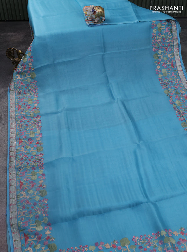 Pure organza silk saree blue with plain body and embroidery border