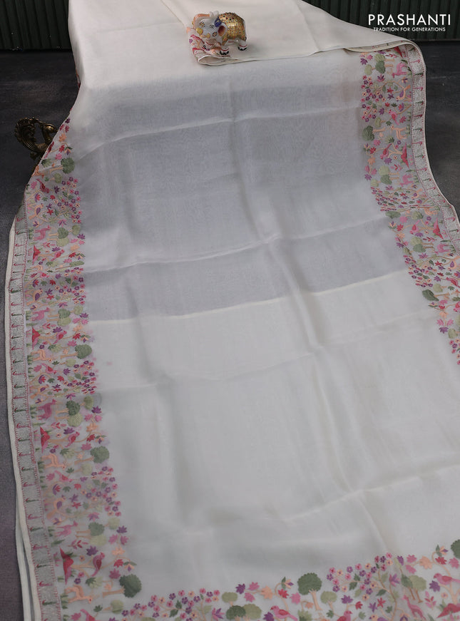 Pure organza silk saree cream with allover convent embroidery and embroidery border
