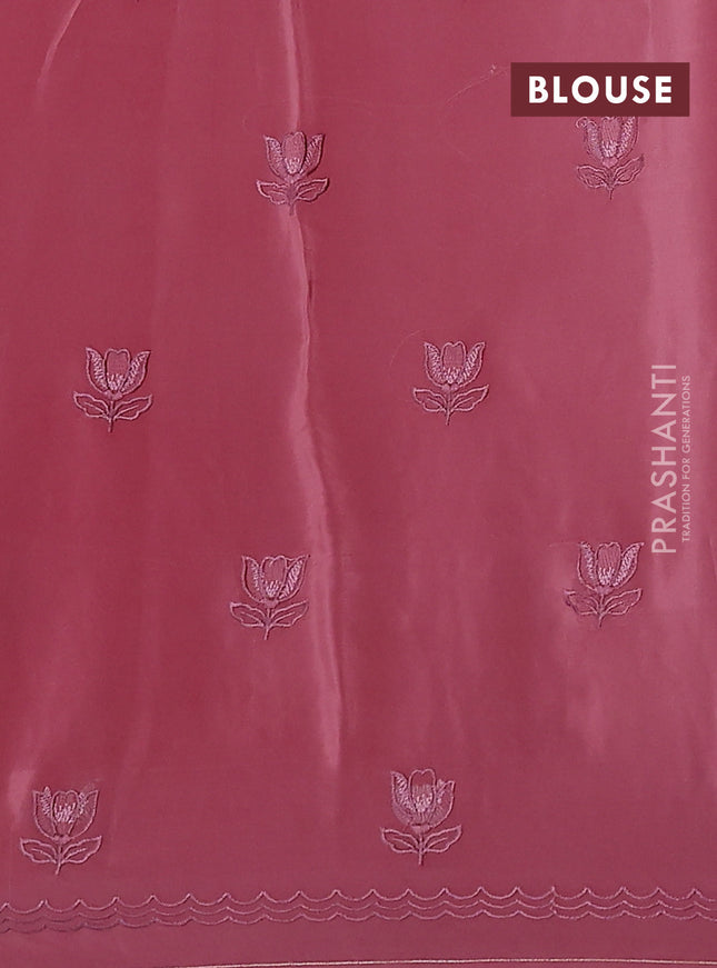 Pure organza silk saree peach pink with plain body and long floral embroidery border