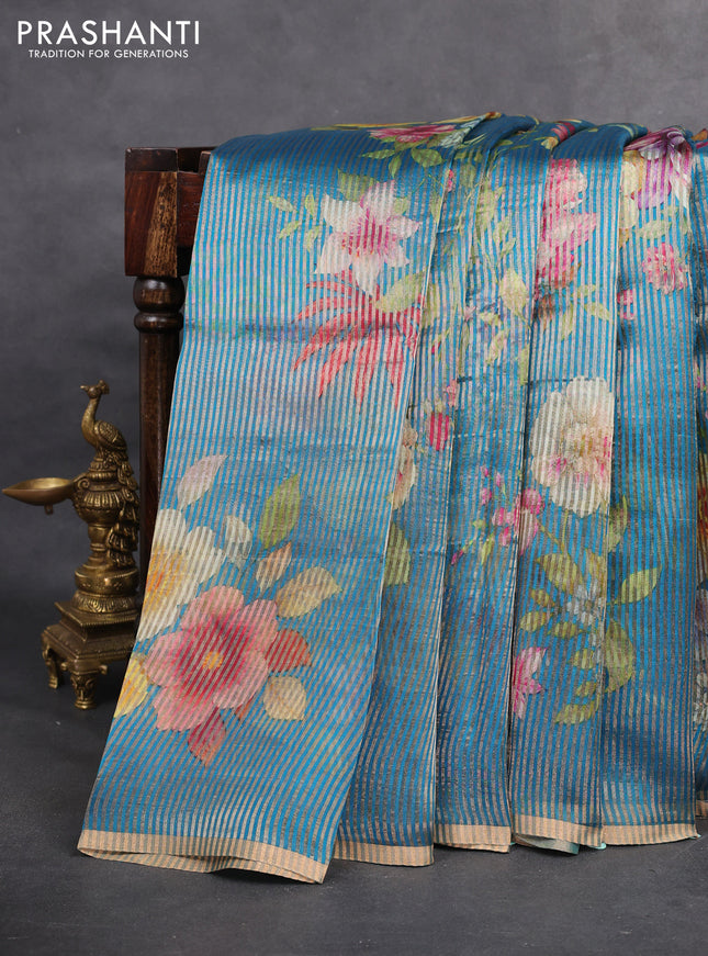 Pure organza silk saree cs blue with floral digital prints & zari stripe pattern and zari woven piping border