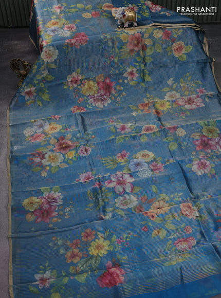 Pure organza silk saree cs blue with floral digital prints & zari stripe pattern and zari woven piping border