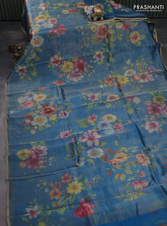 Pure organza silk saree cs blue with floral digital prints & zari stripe pattern and zari woven piping border