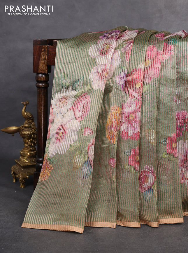 Pure organza silk saree green with floral digital prints & zari stripe pattern and zari woven piping border