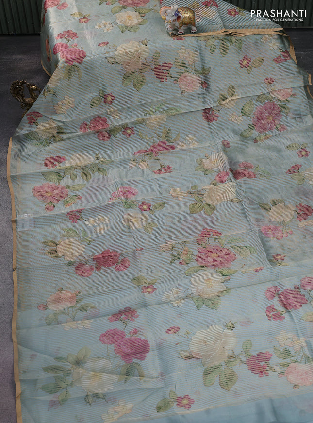 Pure organza silk saree pastel blue with floral digital prints & zari stripe pattern and zari woven piping border