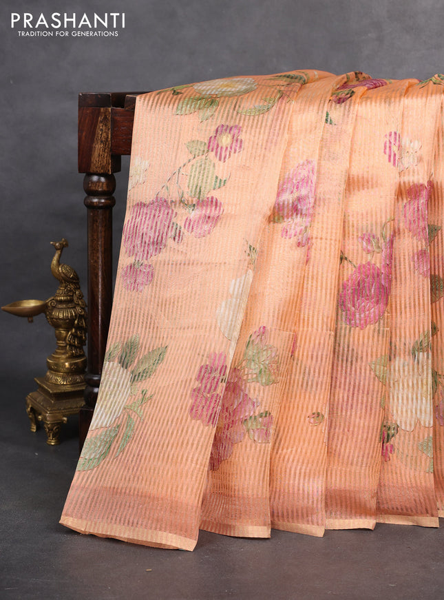 Pure organza silk saree peach orange with floral digital prints & zari stripe pattern and zari woven piping border