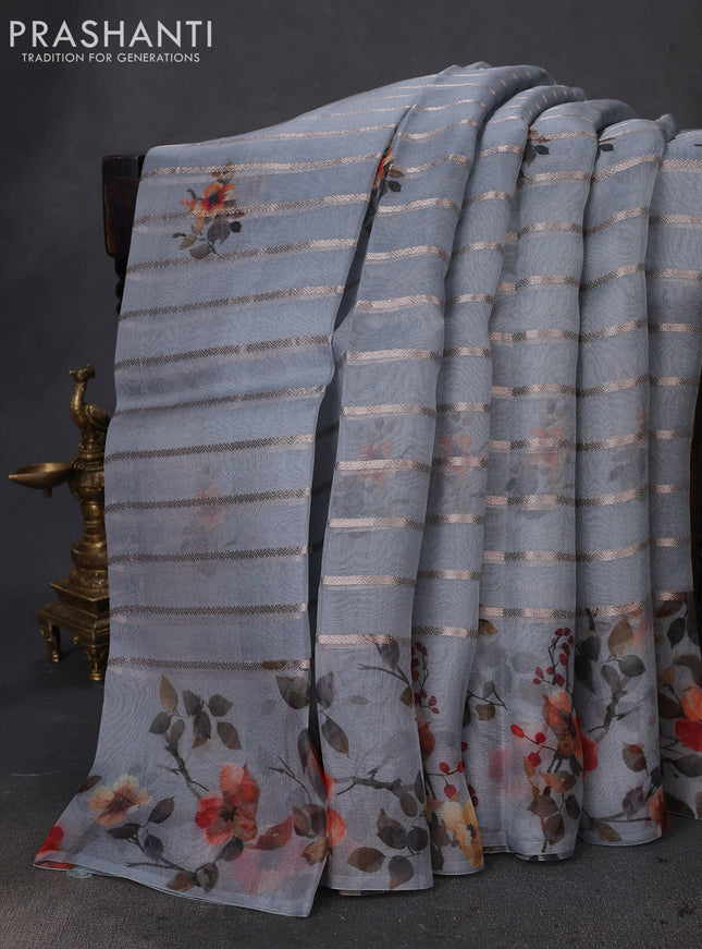 Pure organza silk saree grey with allover zari strip & floral digital prints and floral digital printed border