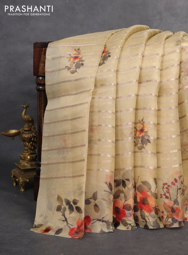 Pure organza silk saree dark beige with allover zari strip & floral digital prints and floral digital printed border
