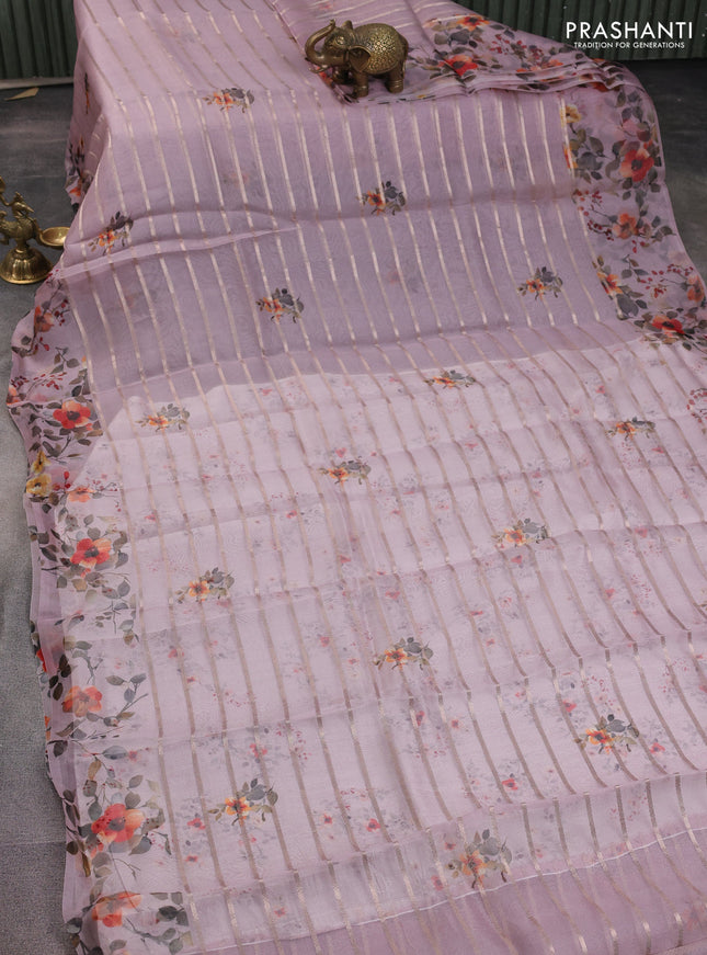 Pure organza silk saree pastel pink with allover zari strip & floral digital prints and floral digital printed border