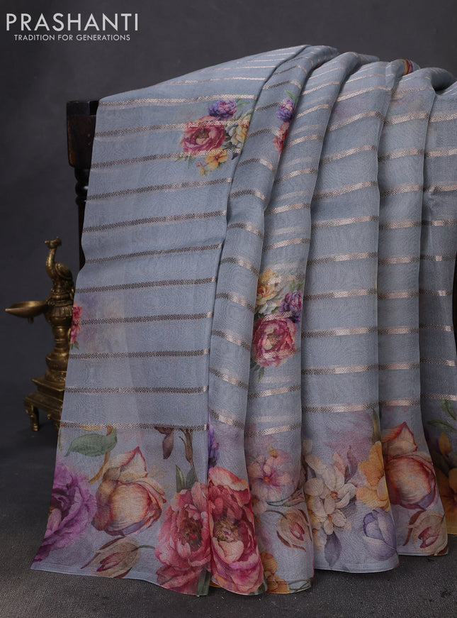 Pure organza silk saree grey with allover zari strip & floral digital prints and floral digital printed border