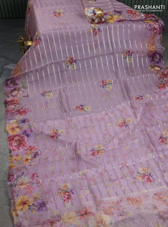 Pure organza silk saree pastel purple with allover zari strip & floral digital prints and floral digital printed border