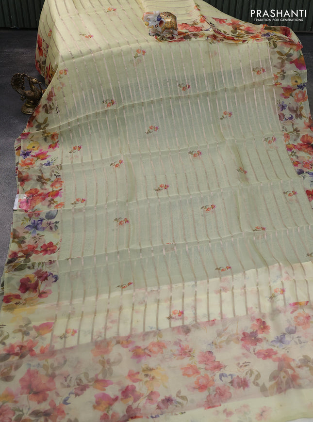Pure organza silk saree lime yellow with allover zari strip & floral digital prints and floral digital printed border
