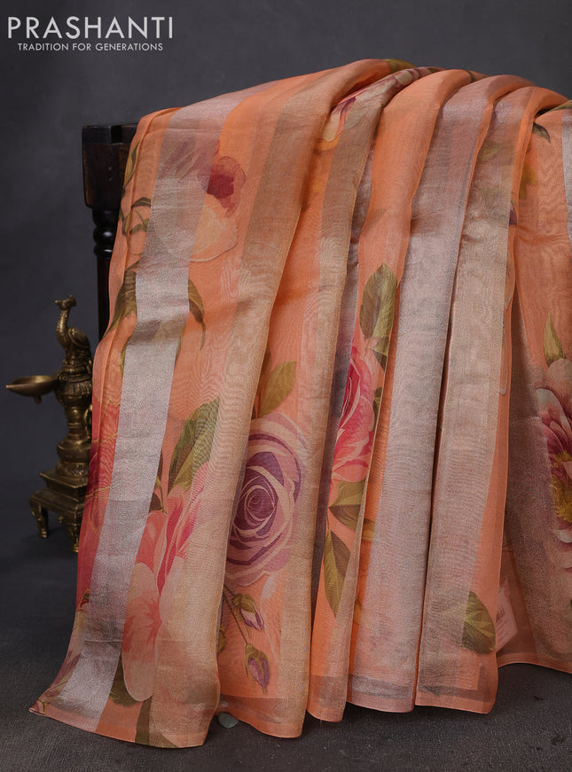 Pure organza silk saree orange with allover floral digital prints & zari stripe pattern in borderless style