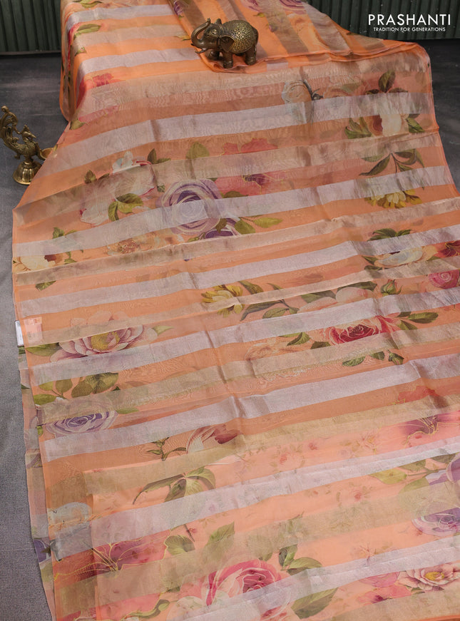 Pure organza silk saree orange with allover floral digital prints & zari stripe pattern in borderless style