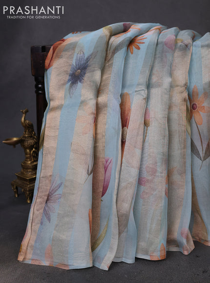 Pure organza silk saree pastel blue with allover floral digital prints & zari stripe pattern in borderless style