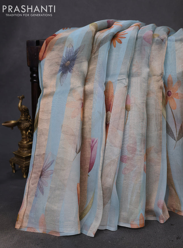 Pure organza silk saree pastel blue with allover floral digital prints & zari stripe pattern in borderless style